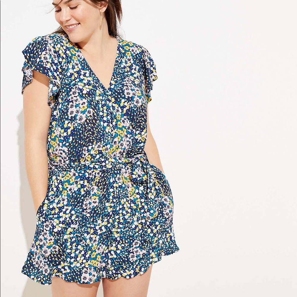 PLUS FLUTTER WRAP ROMPER IN FOREVER NAVY